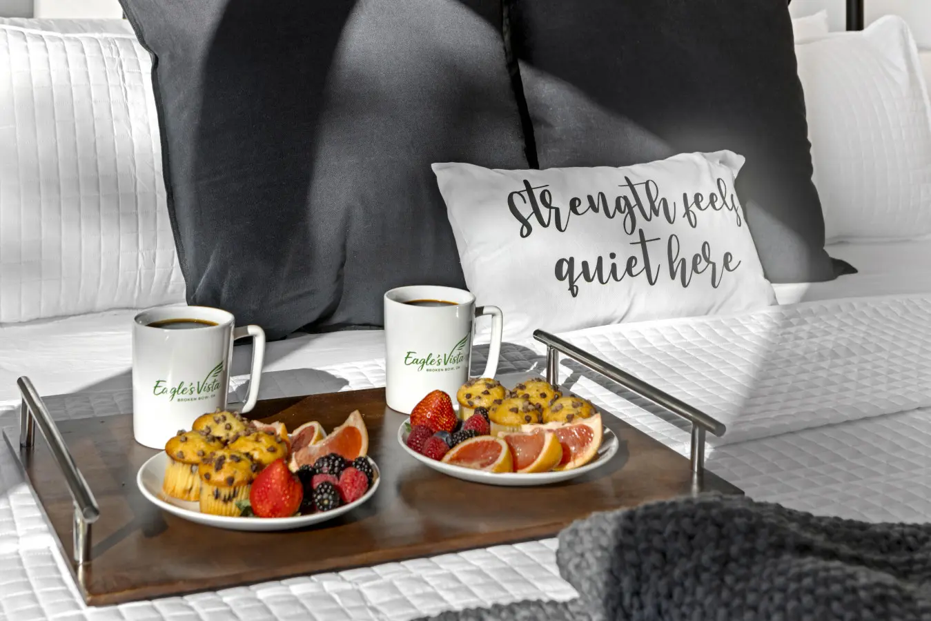 Wake up to cozy mornings in our perfectly styled master bedroom with layered textures and serene bedside comfort.