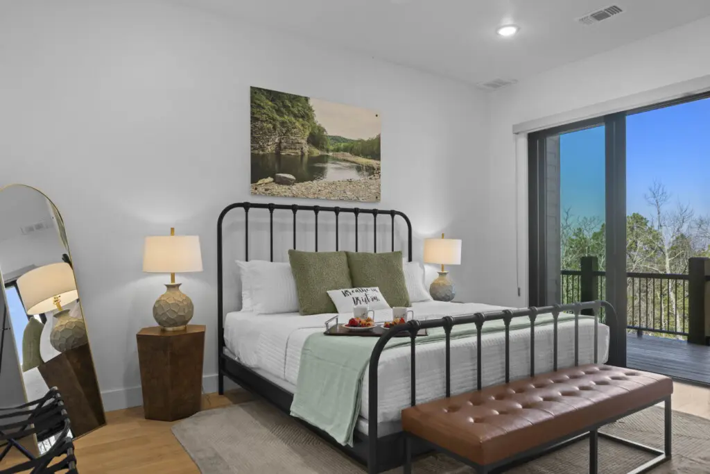 Wake up to treetop views in this king suite that opens right onto the deck.