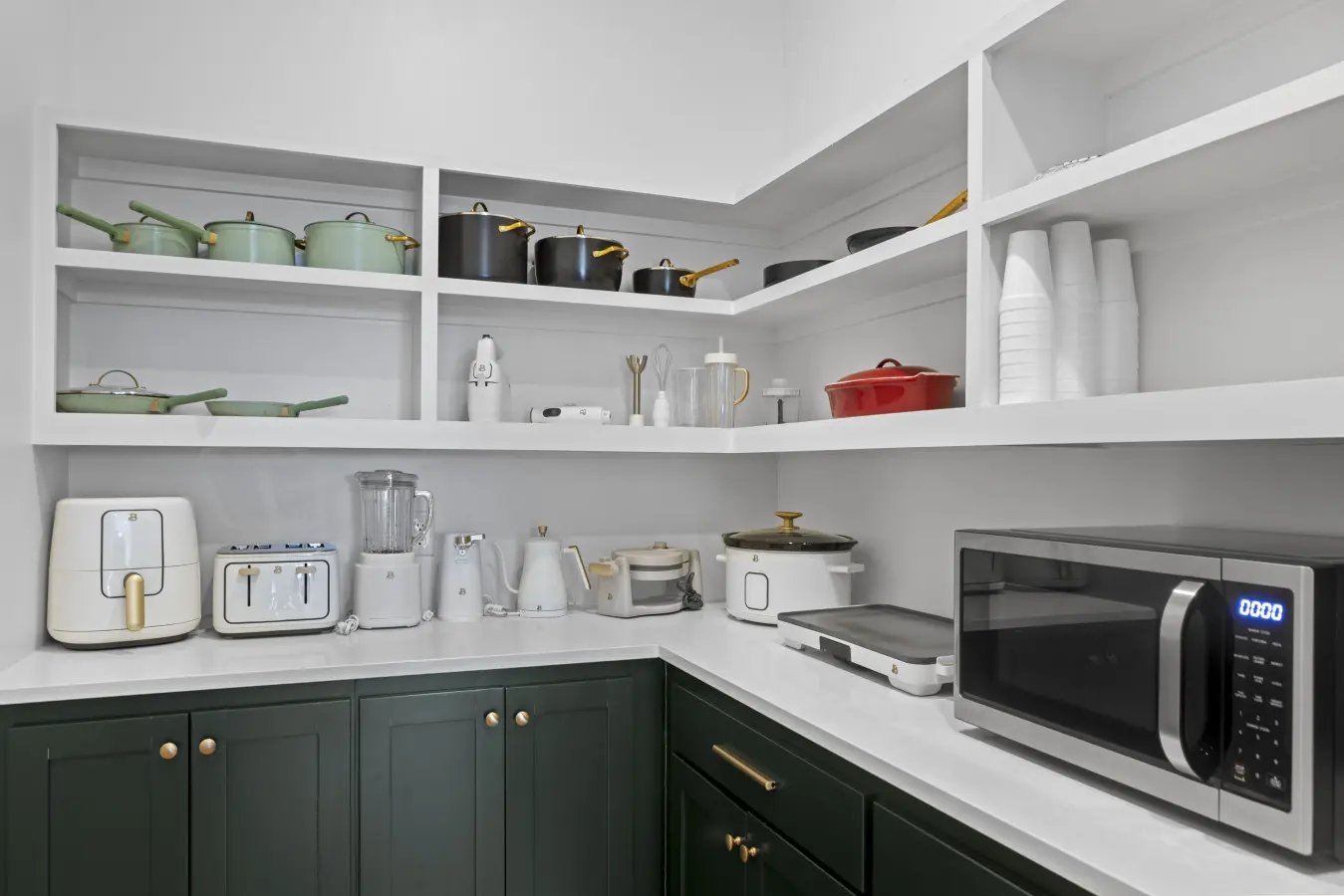 The walk-in pantry is stocked with matching cookware and every small appliance you could need for feeding a crowd.