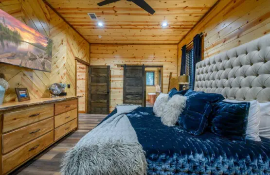 This gorgeous master suite combines rustic wood charm with upscale comfort and those dreamy views.