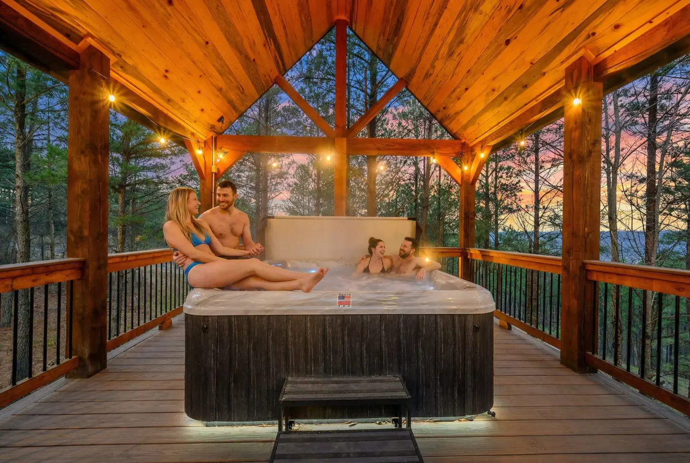 Soak under the stars in this gorgeous covered hot tub pavilion with forest views on every side.