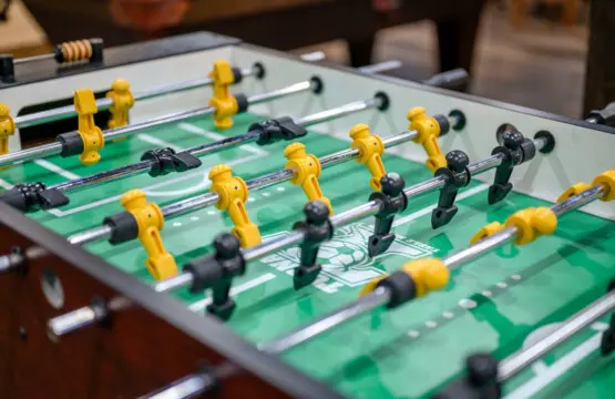 This foosball table is perfect for friendly competition on a rainy afternoon.