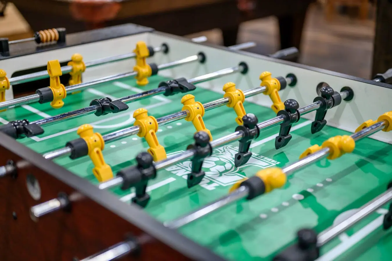 This foosball table is perfect for friendly competition on a rainy afternoon.