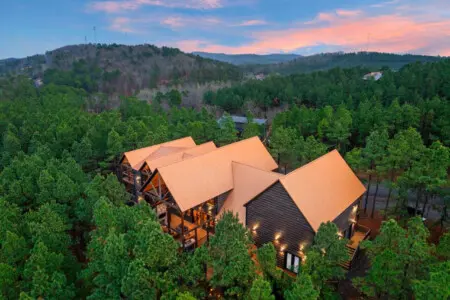 Stunning modern cabin nestled in the pines with breathtaking mountain views and enough space for the whole crew.