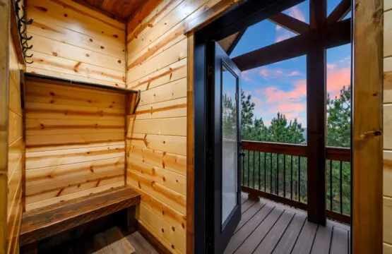 Wake up to mountain views and pine trees from your private sauna on the deck.