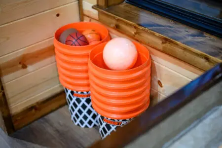 Cozy game room nook with basketball hoops perfect for keeping the kids entertained during your stay.