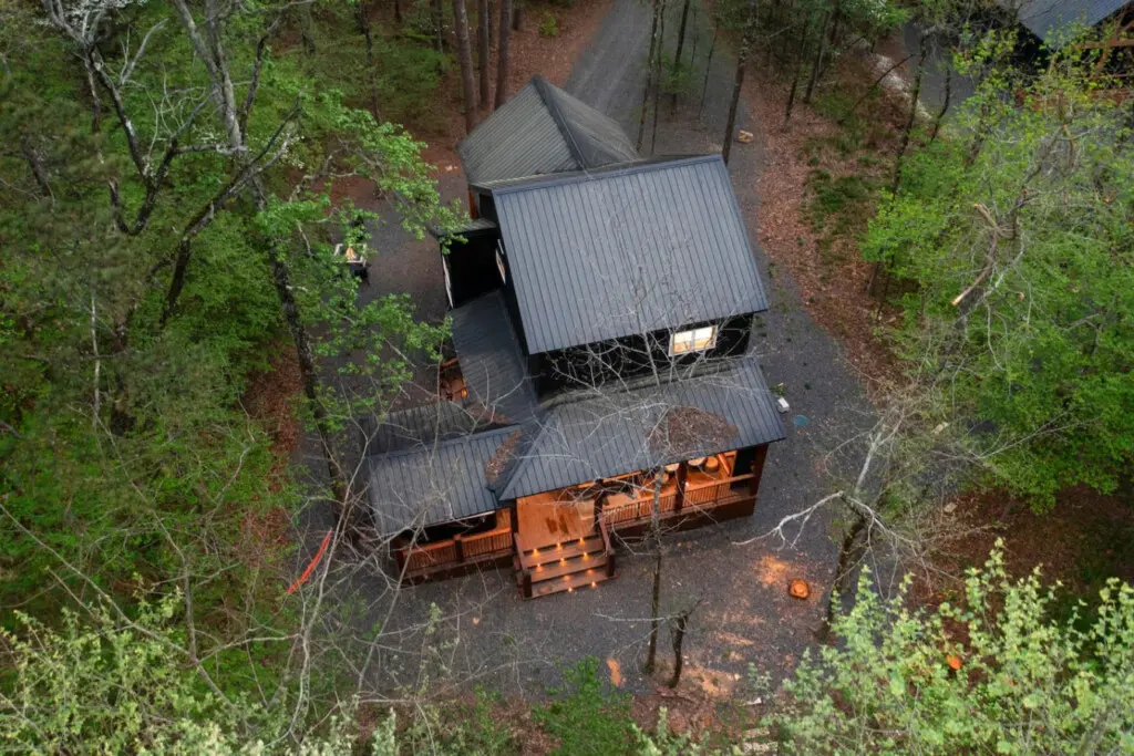 The well-equipped kitchen makes meal prep a breeze in your serene retreat.
