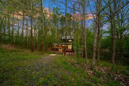 Wake up refreshed in a comfortable bedroom overlooking the water.