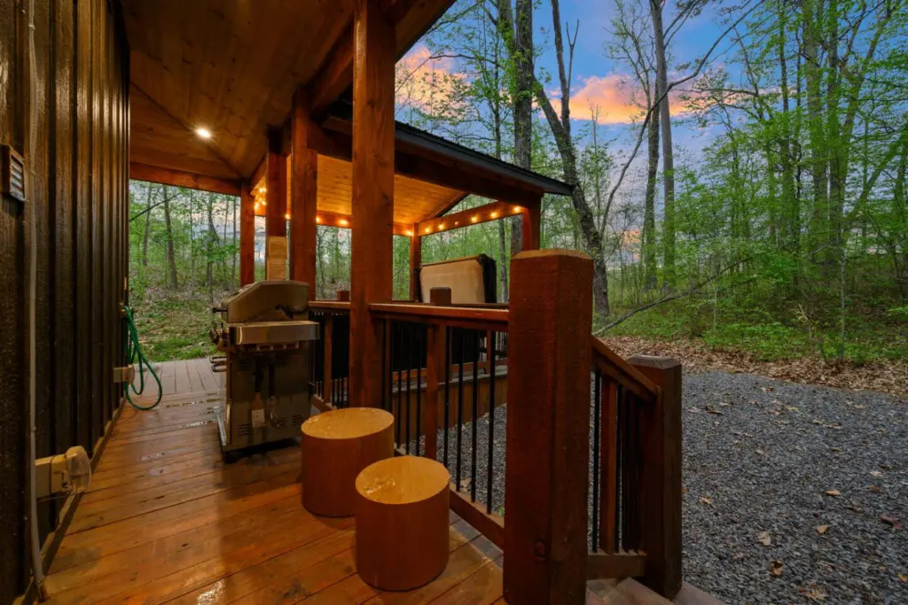 The modern bathroom features a spacious shower and elegant finishes.