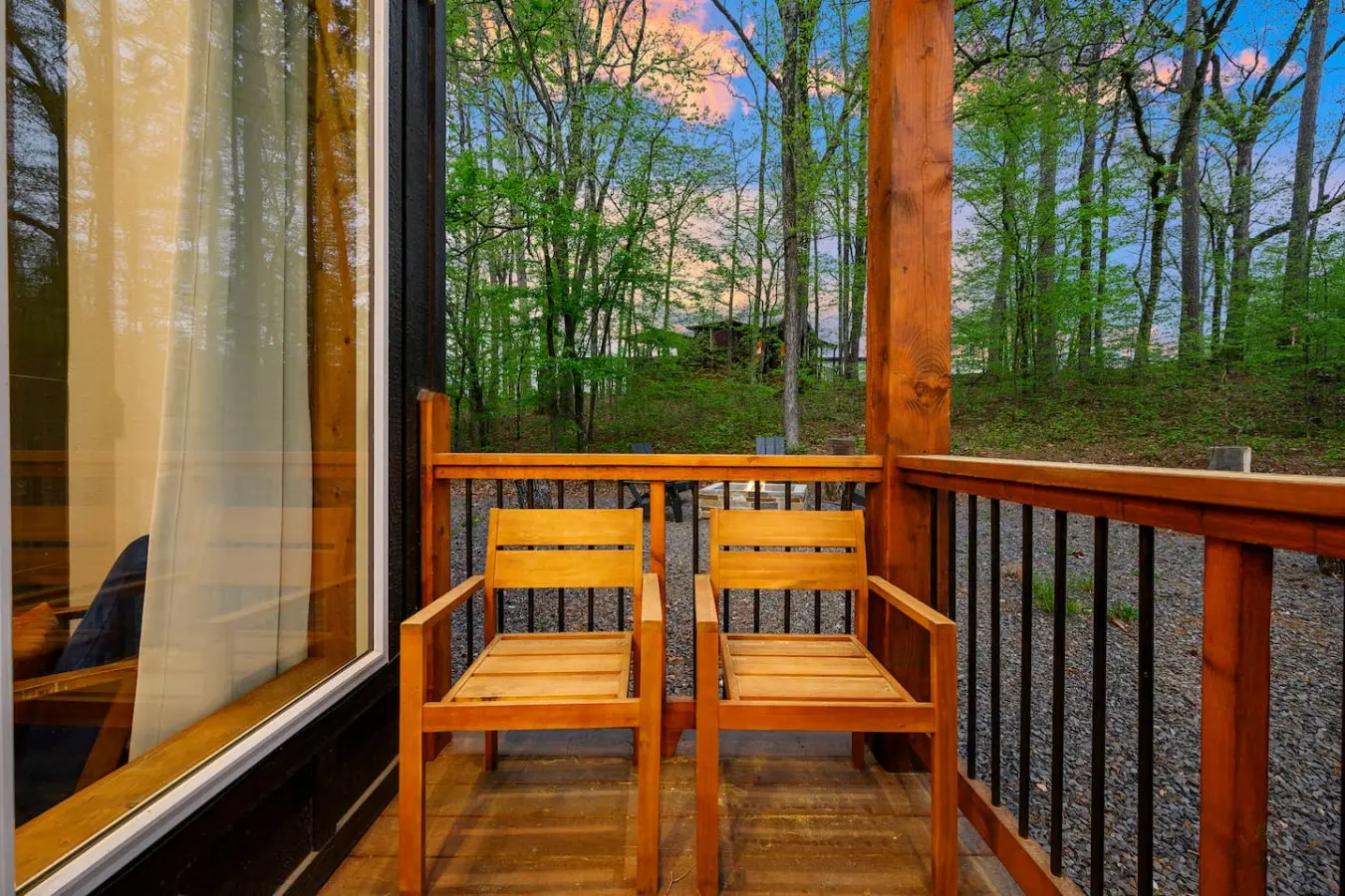 The modern bathroom features a spacious shower and elegant finishes.
