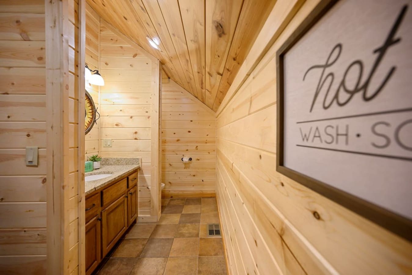 Enter the pathway to serenity with our welcoming bathroom hallway.