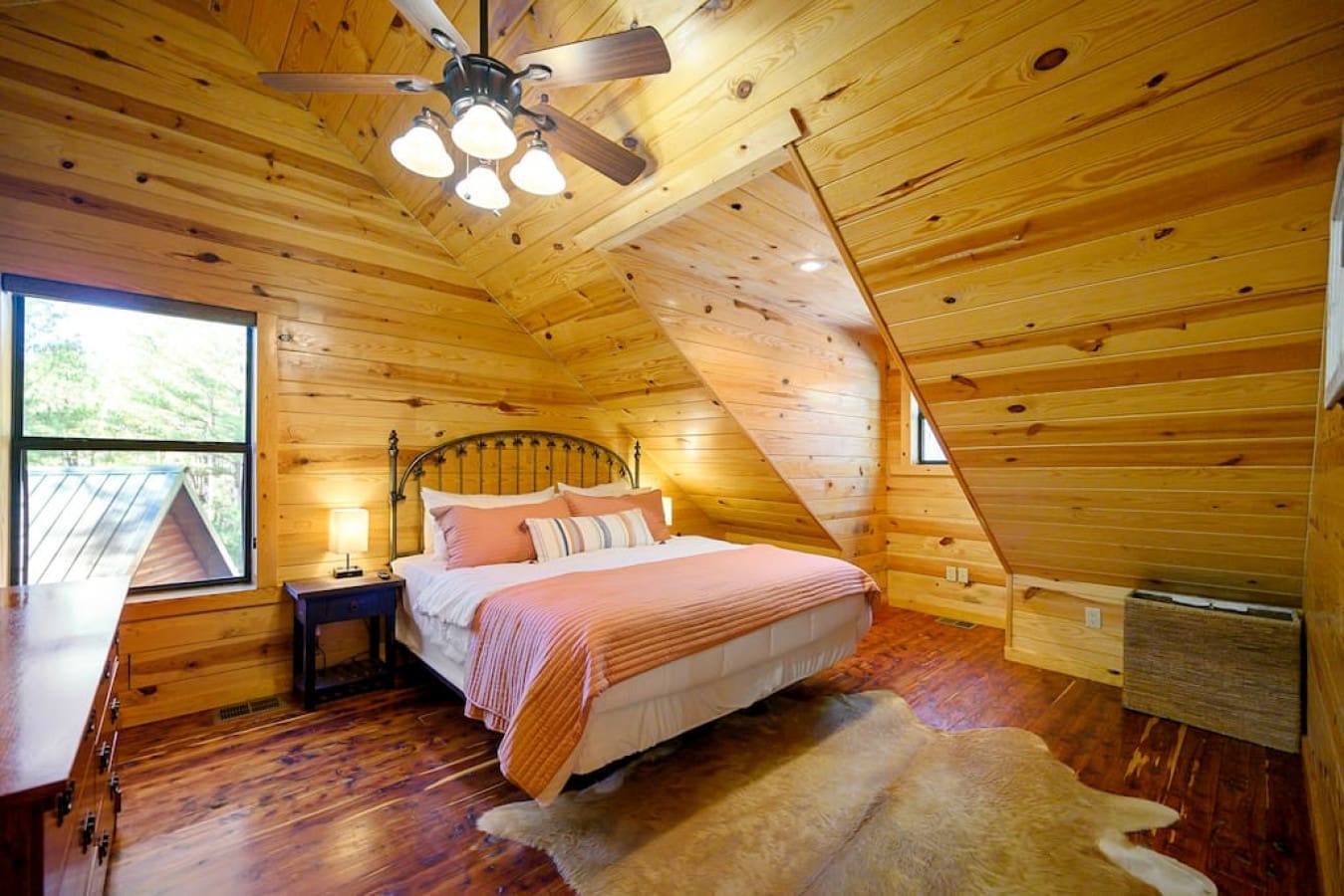 Unwind in our cozy bedroom, complete with a comfortable bed and the convenience of two night lamps on each side. The ceiling light provides a warm ambiance, and a wide window allows for plenty of natural light, making it the perfect place to relax and res