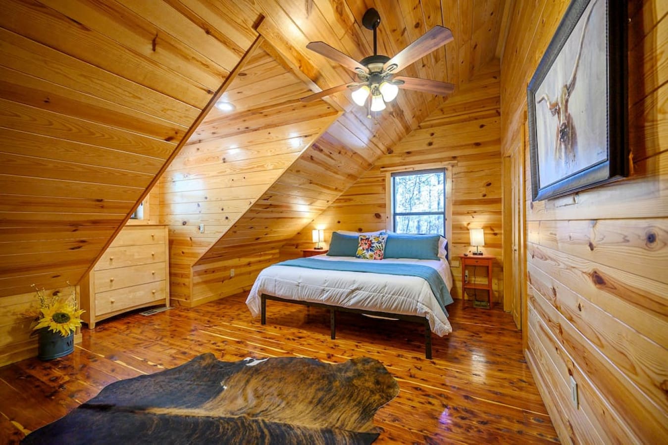 Experience the ultimate bedroom retreat with our elegant bed, adorned with night lamps on each side for a serene glow. A stylish ceiling lamp bathes the room in gentle radiance, while a plush carpet with intricate designs adds a touch of luxury underfoot.