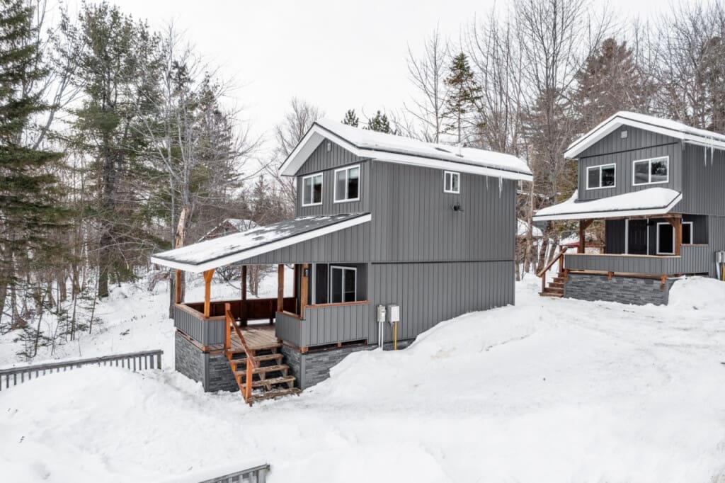 In the heart of winter's embrace, find solace in our cabin's embrace.