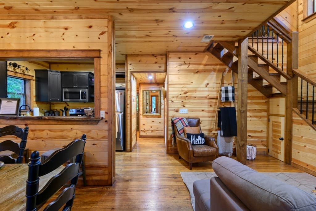 Underneath the rustic beams, find a harmonious blend of nature and comfort. Welcome to our cabin's sanctuary.
