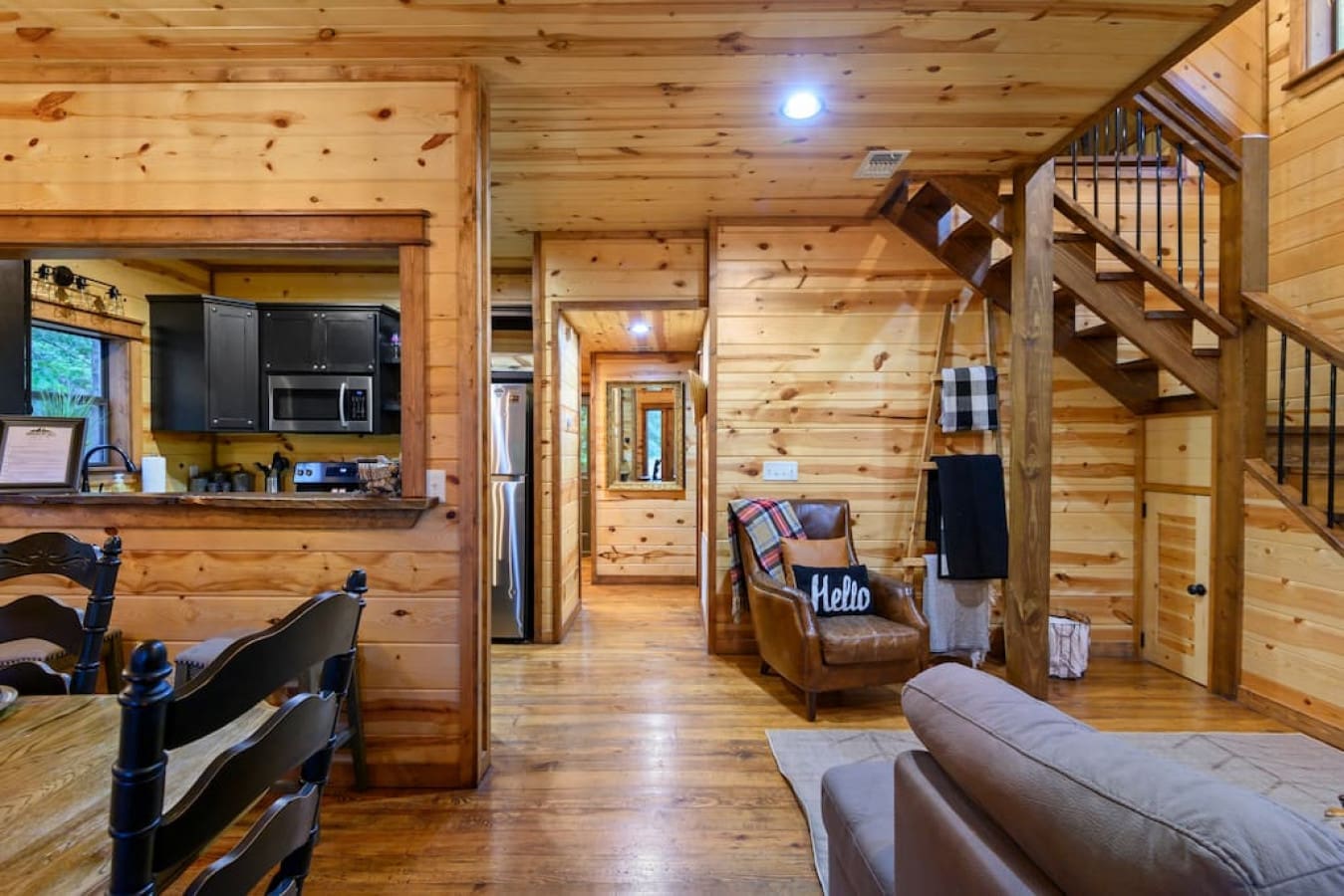 Underneath the rustic beams, find a harmonious blend of nature and comfort. Welcome to our cabin's sanctuary.