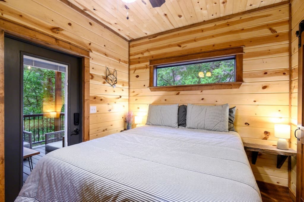Embrace the warmth of the cabin and the embrace of slumber in the comfort of the bedroom.