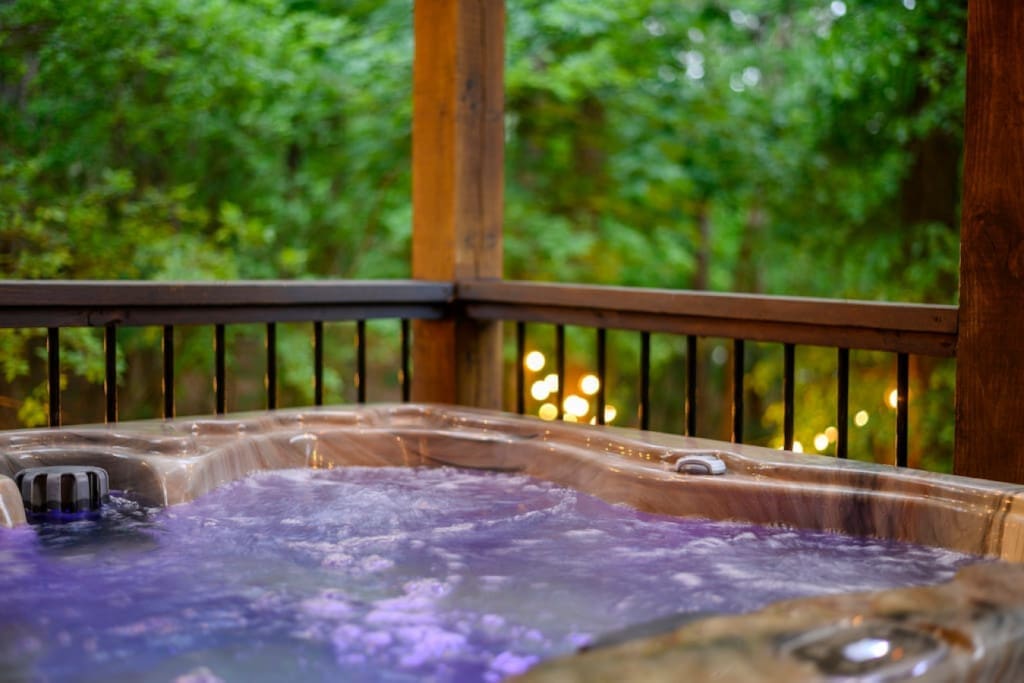 Bubbles, bliss, and breathtaking scenery: Welcome to our cabin hot tub.