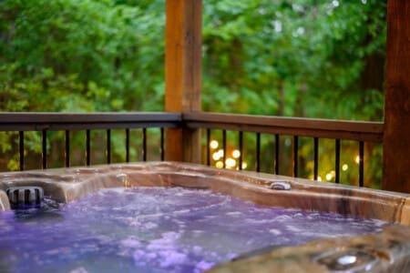 Bubbles, bliss, and breathtaking scenery: Welcome to our cabin hot tub.