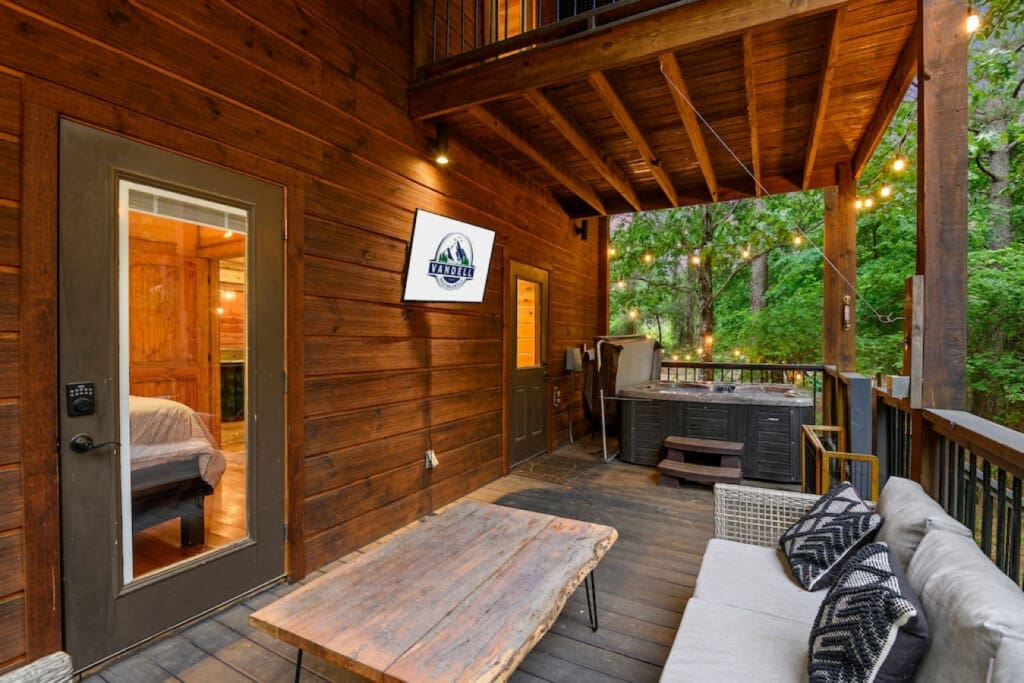 Where comfort meets nature: Our cabin porch sanctuary.