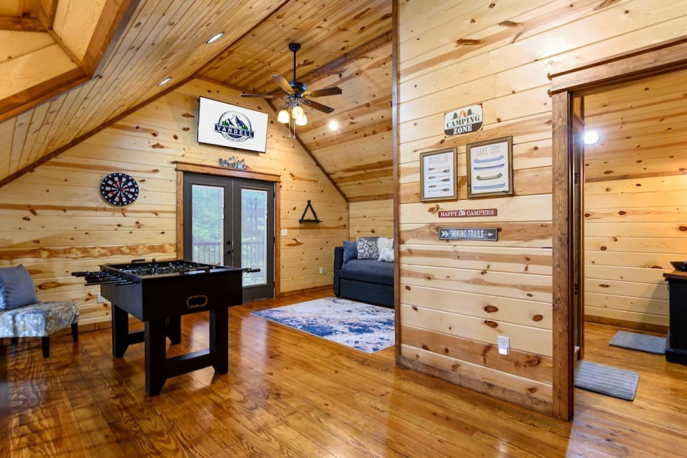 Bring your A-game and your relaxation mode to our cabin's foosball and lounge zone.