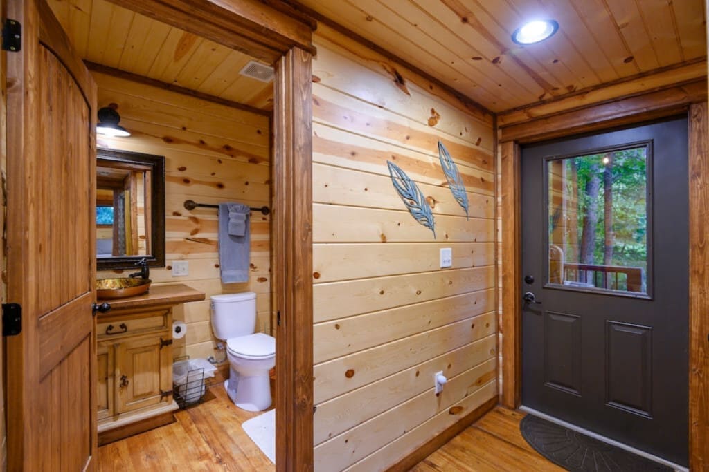 Where the earthy tones of wood bring tranquility to your bath.