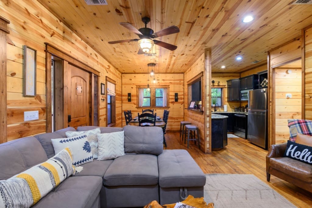 Where cooking, dining, and lounging intertwine: Welcome to our cabin's heart of the home.