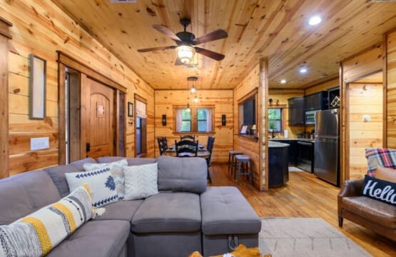 Where cooking, dining, and lounging intertwine: Welcome to our cabin's heart of the home.