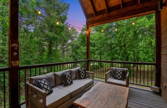 Breathe in the mountain air, exhale your worries: Our outdoor cabin porch.