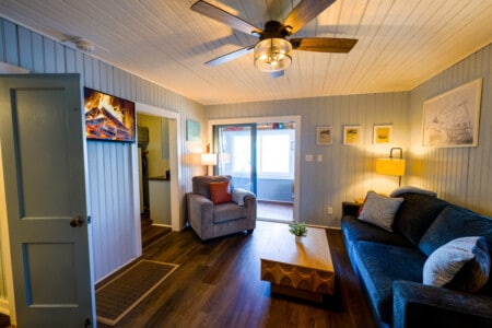 Curl up with a movie by the virtual fire while lamplight warms the whole room.