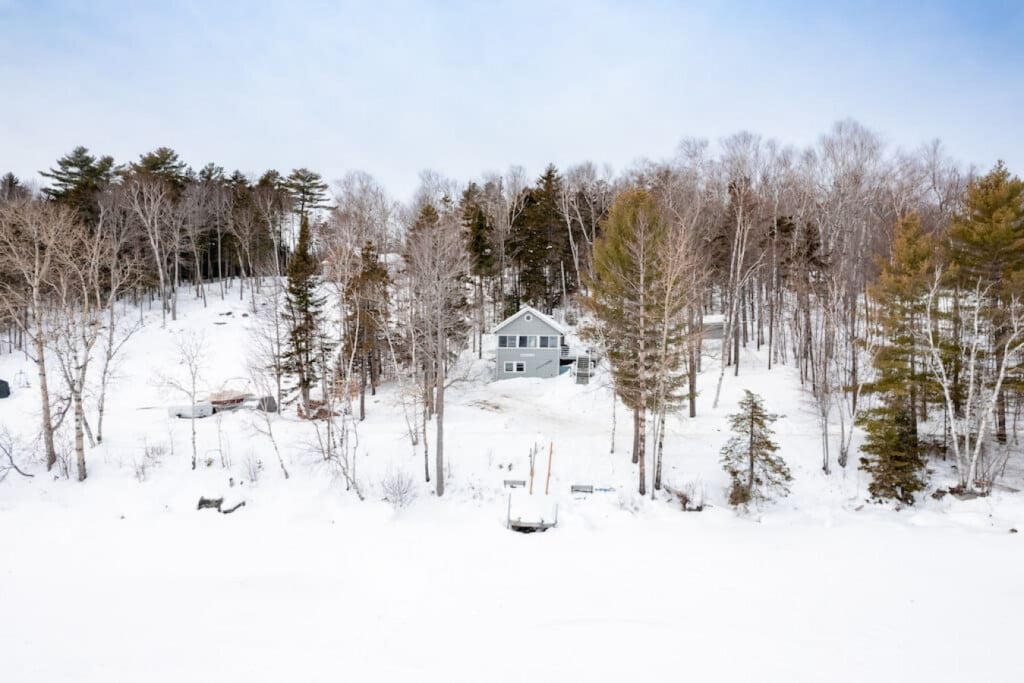 Bare winter trees and frozen lake views make this the ultimate off-season hideaway.