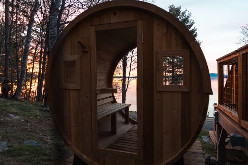 Step into the sauna and watch a fiery sunset melt into the mountains.