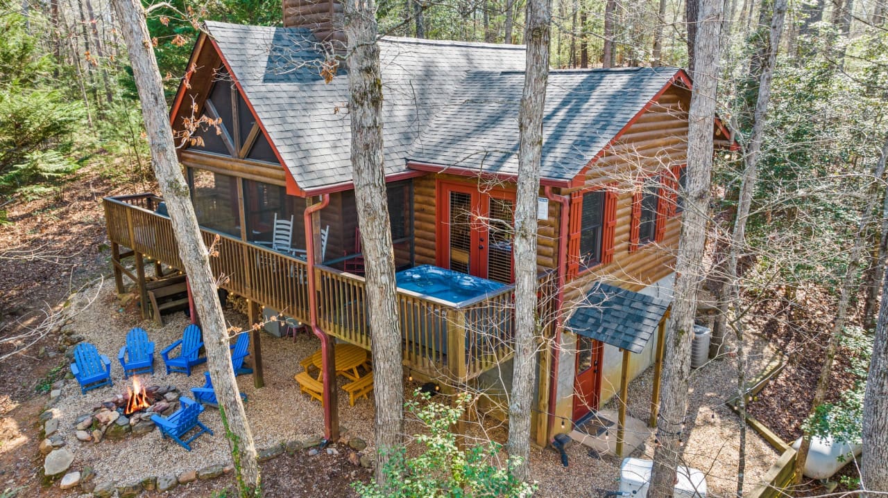 "Escape to the canopy: our cabins offer a breathtaking view from above among the trees.