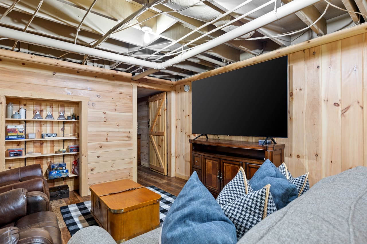 Sofas that hug you back and a screen that draws you in—welcome home.