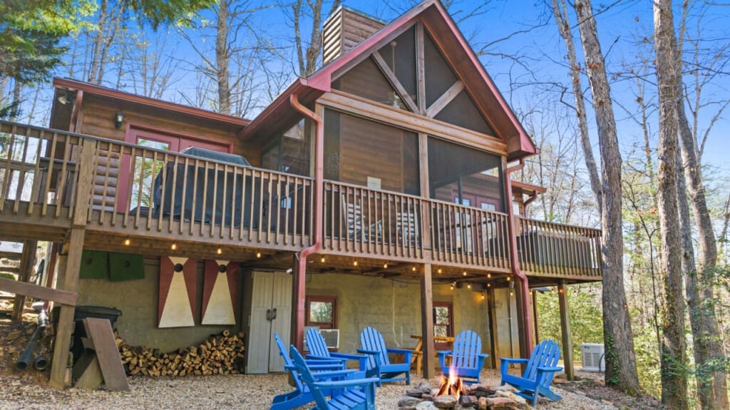 Welcome to rustic charm: our cabin beckons with a cozy firepit at its heart.
