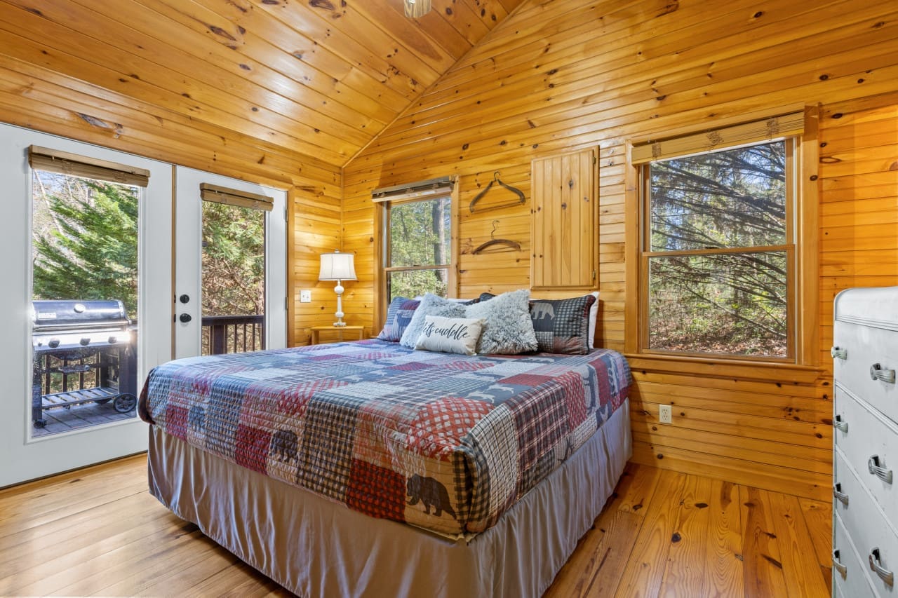 Escape to tranquility: our cozy bedroom awaits, ready to envelop you in comfort.