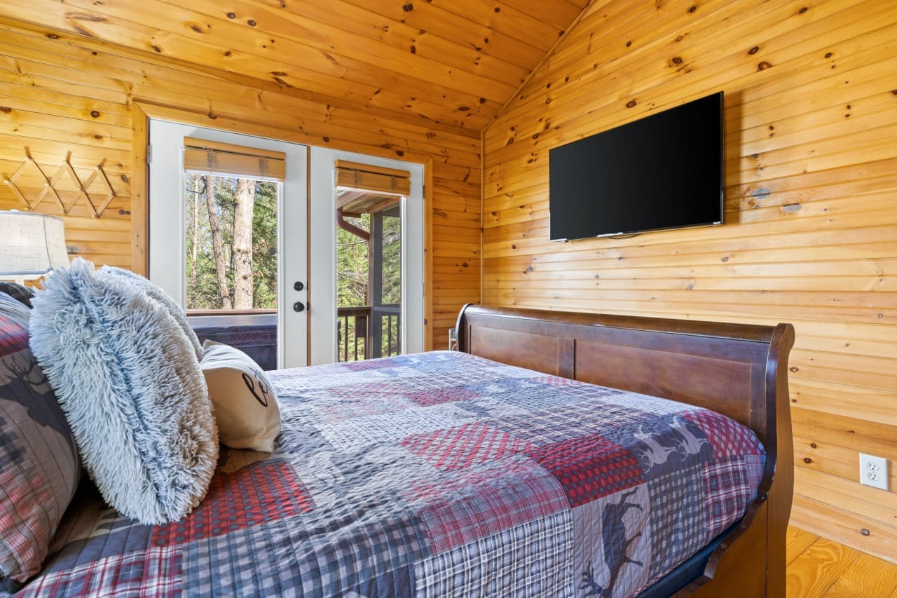 Turn your bedroom into a cozy cinema: our TV-equipped haven is perfect for movie nights and more.