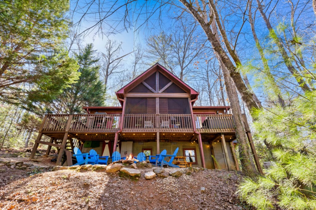 Wake up to the whispers of the forest: our cabin is surrounded by the silence of towering trees.