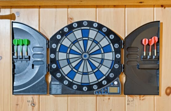 Ready, aim, score! Test your accuracy at our classic darts board.