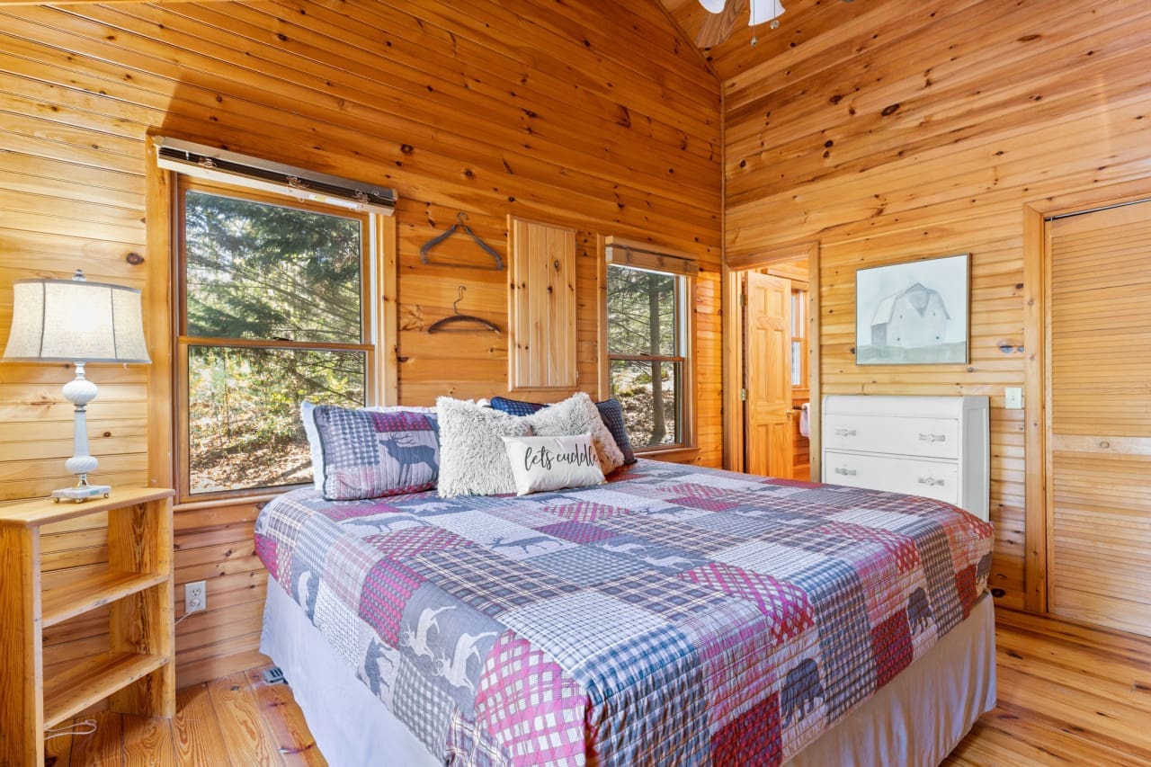 Escape to a world of tranquility, enveloped by the rustic allure of wood.