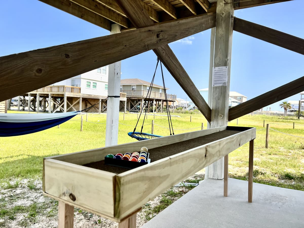 Shoot some pool with a view—because why choose between game night and beach vibes when you can have both?