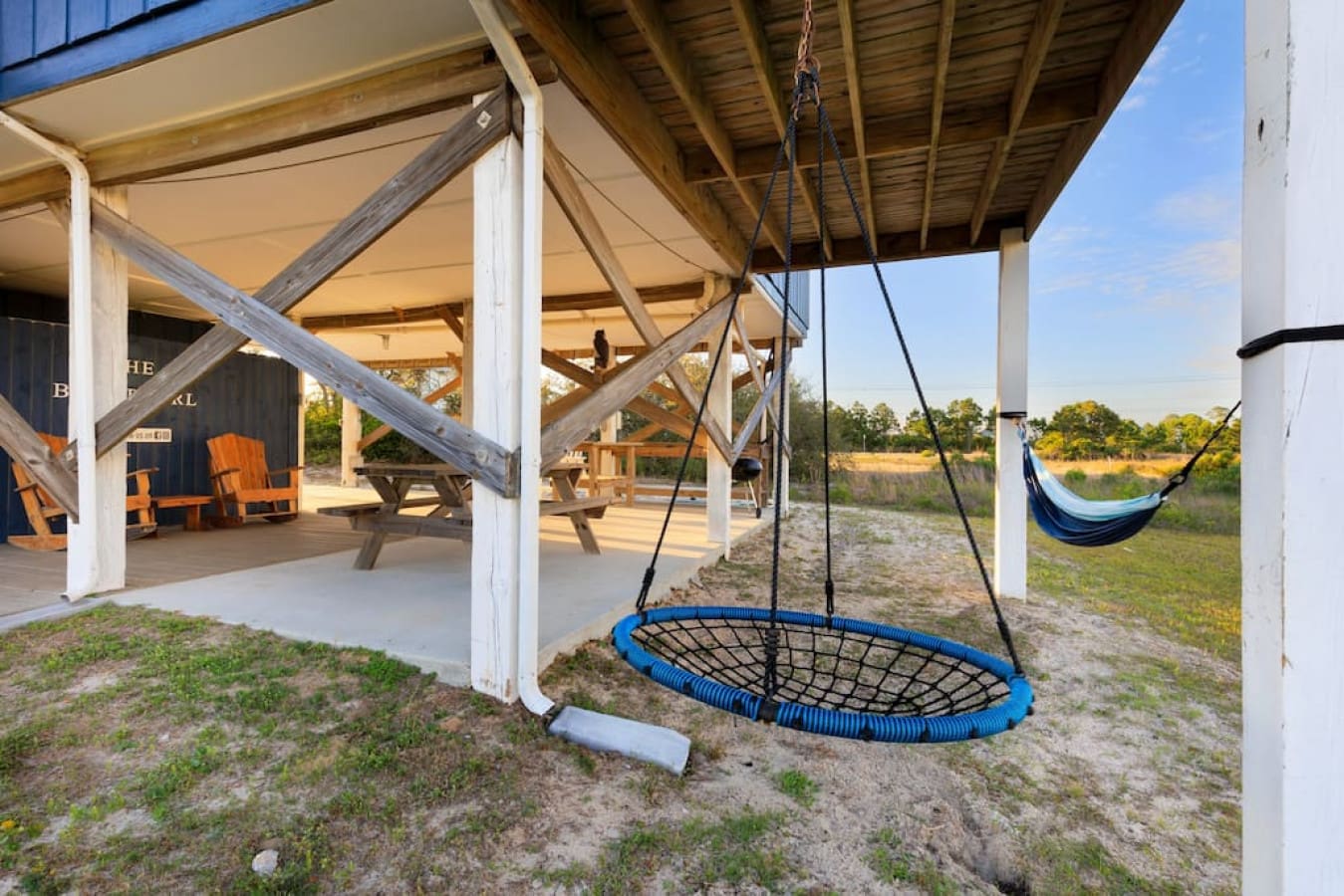 Grab a swing and let the day just drift by on this sprawling deck.