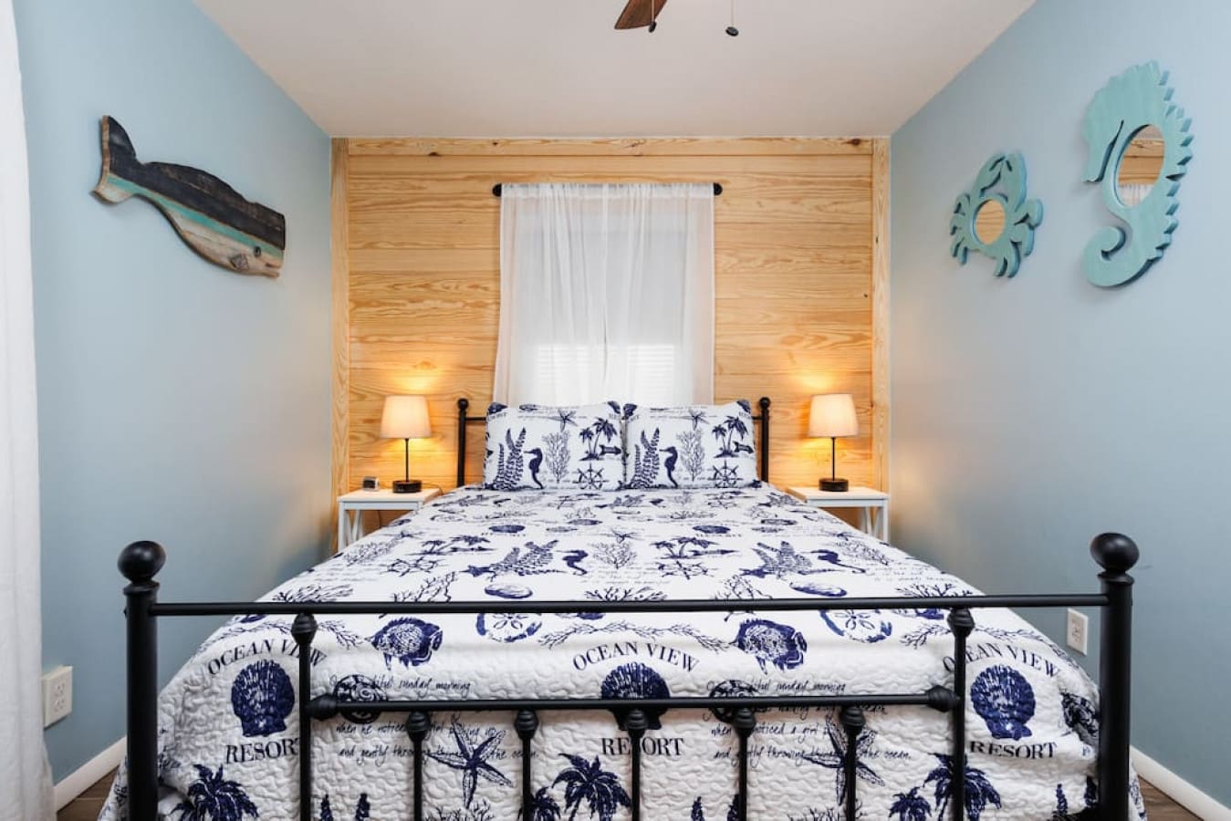 Wake up ready to sail away in this charming nautical bedroom that'll make you feel like you're staying in a seaside captain's quarters.