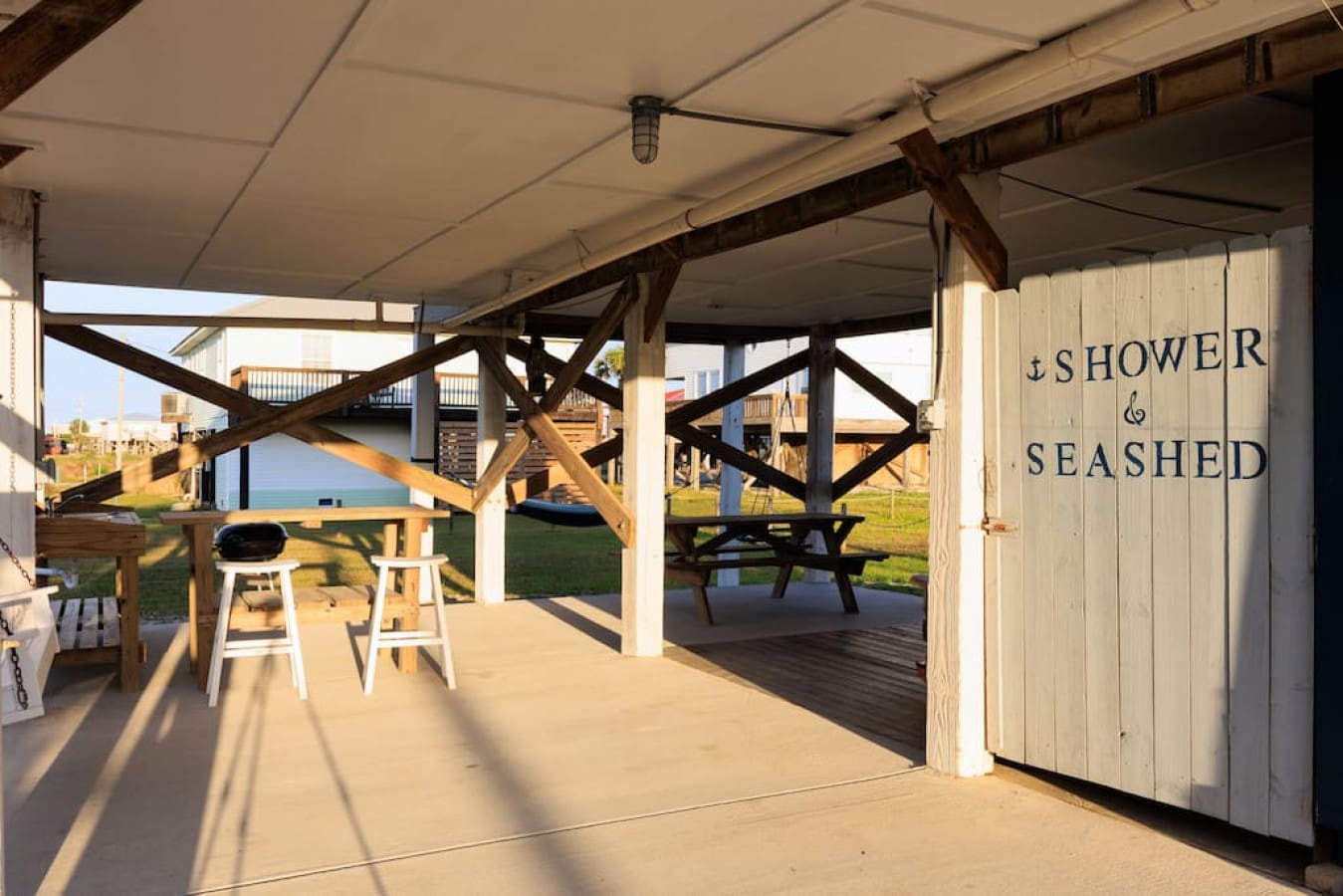 Grab a seat on this covered patio and just exist for a while with the beach basically in your backyard.