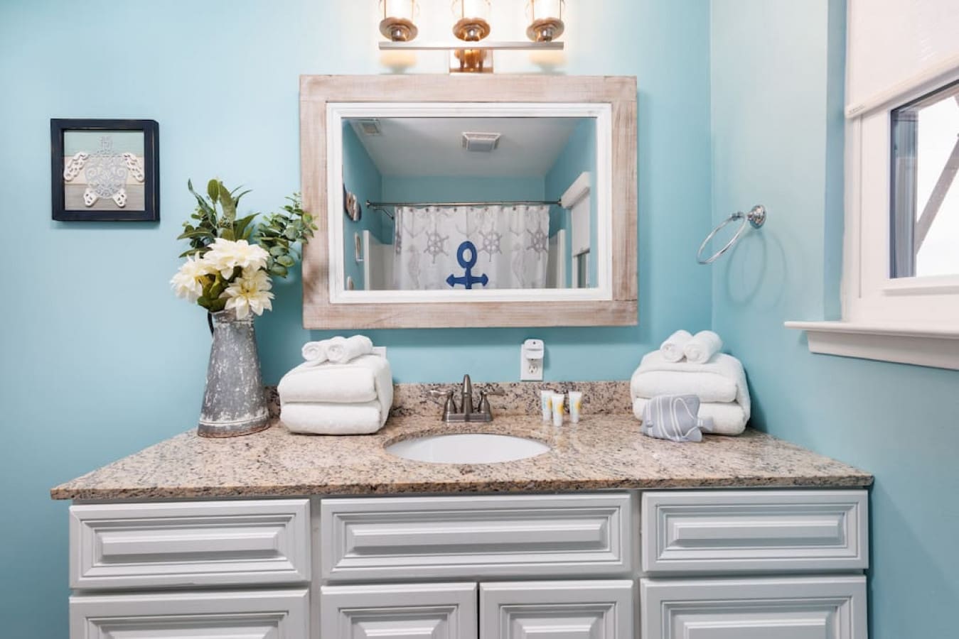 Your morning shower just got a serious upgrade with these beachy turquoise walls that'll make you feel like you're bathing in a tropical lagoon.