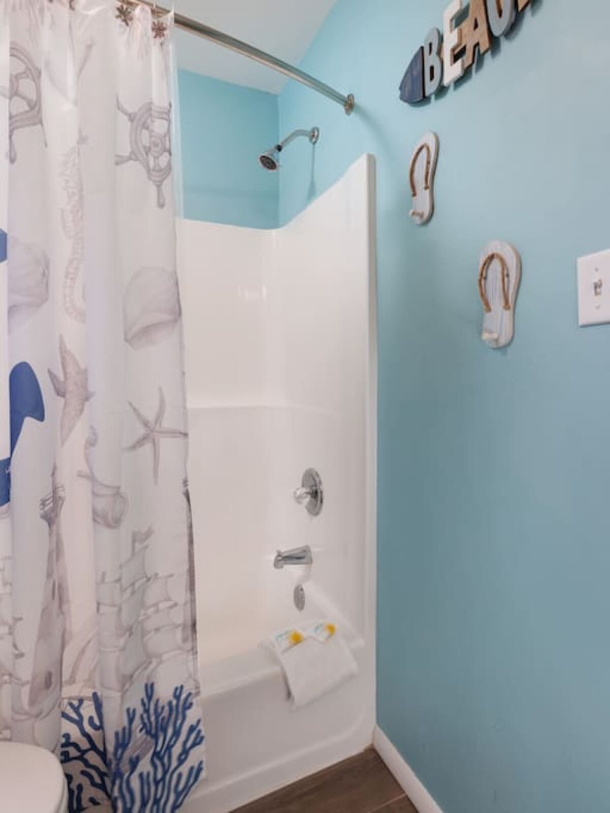 Even your morning routine feels like a mini vacation in this breezy turquoise bathroom.