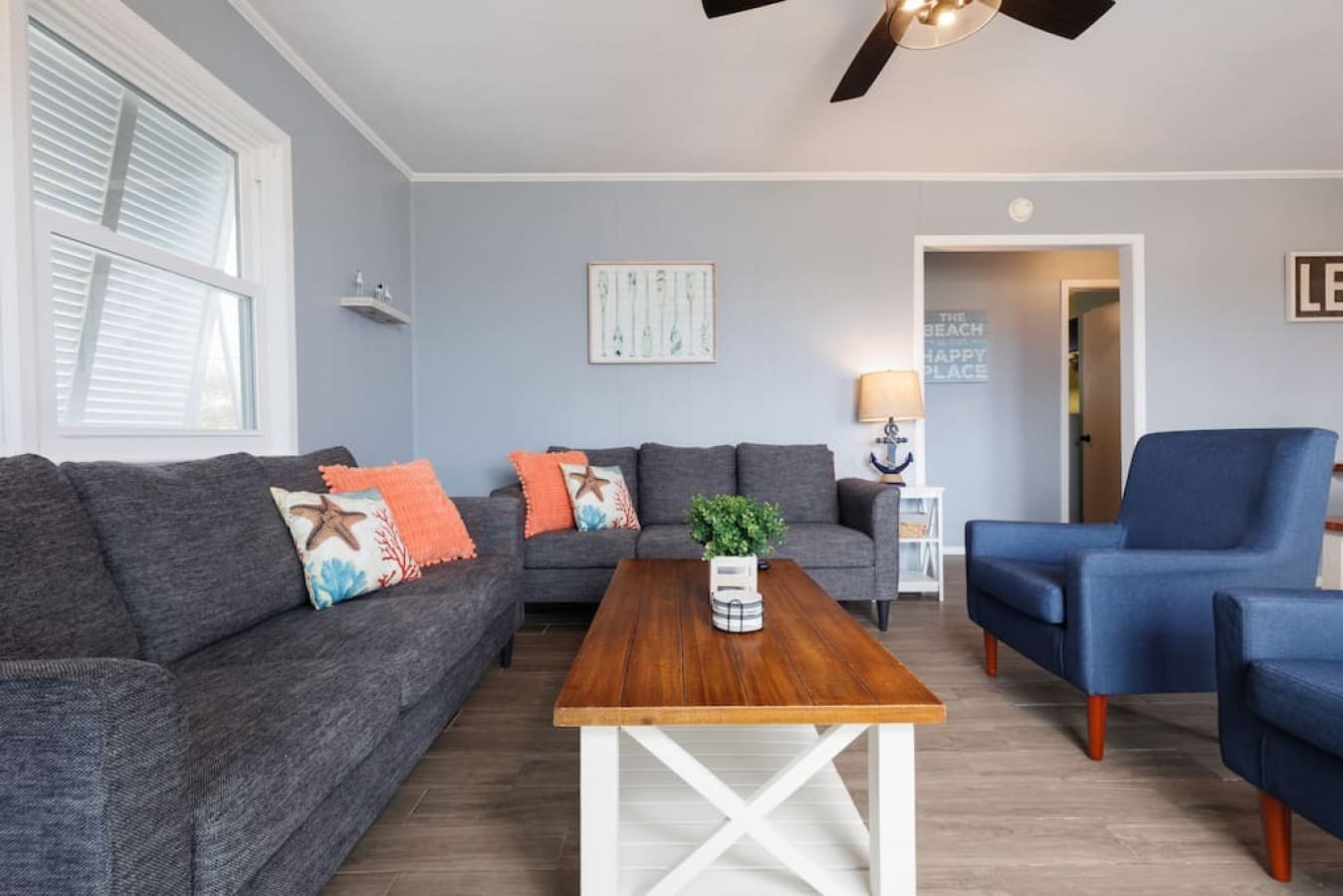 Kick back in this breezy coastal living room where the whole vibe just feels like a perpetual beach day.