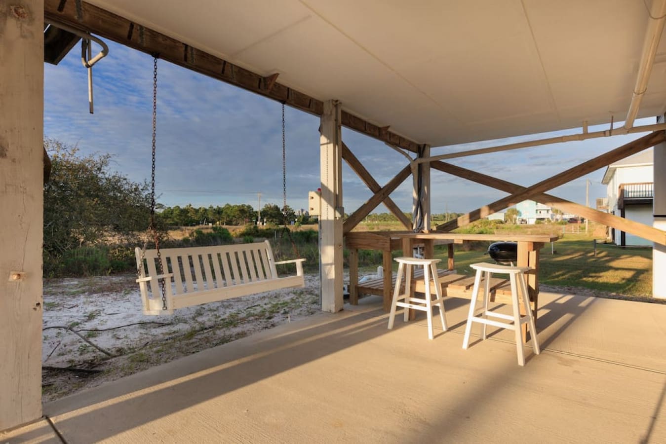 Kick back on the porch swing or pull up a seat at the bar and watch the world go by.