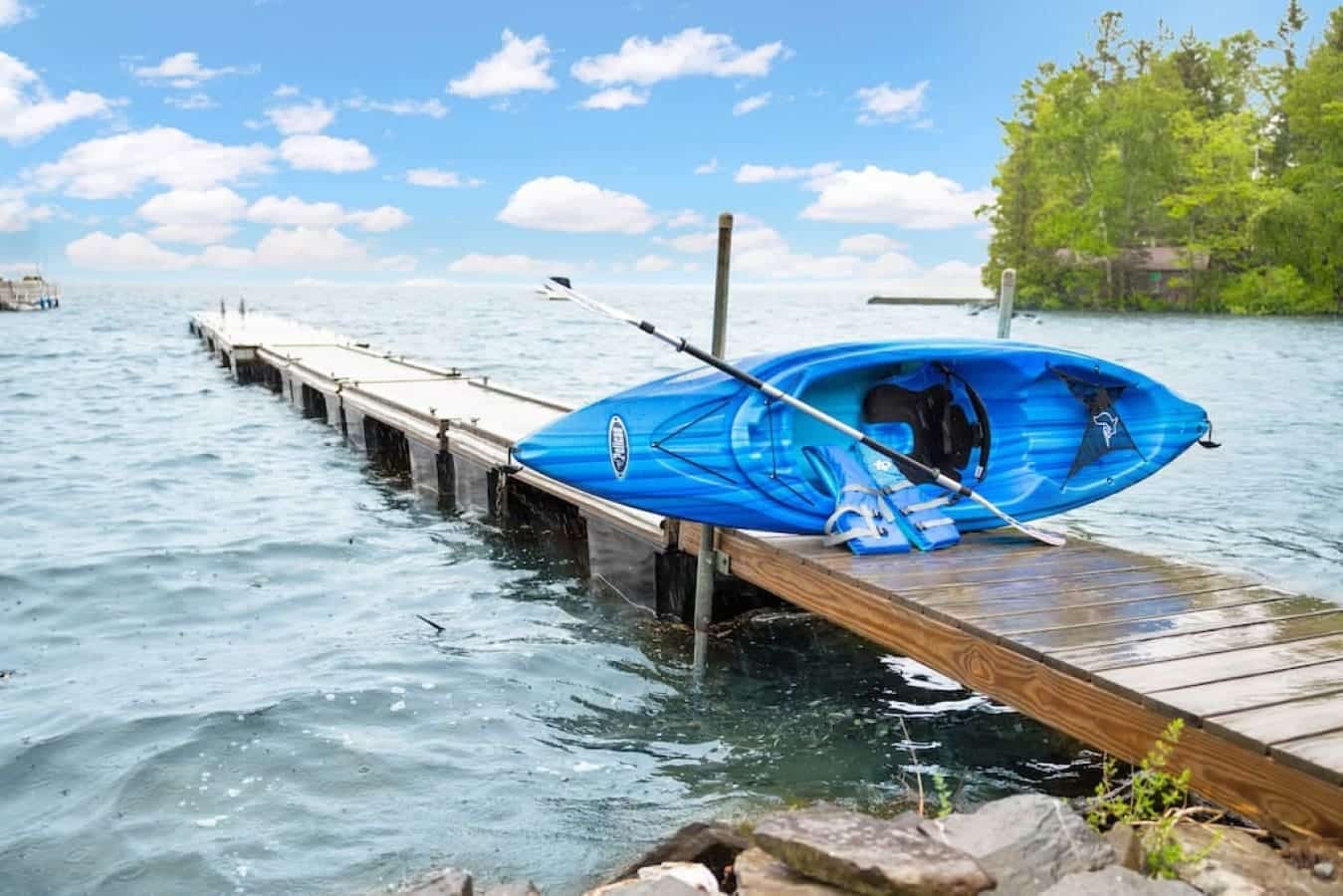 Kayak poised on the jetty, waiting for adventure.