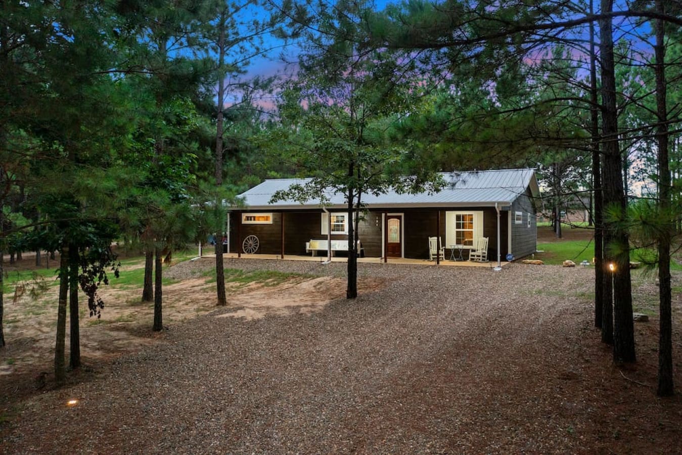 Our cabin's outdoor haven awaits, where the only noise is the rustle of leaves and the call of wild.